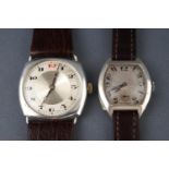 A selection of two wristwatches having manual wind movements and sterling silver cases.