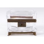 A French nineteenth century cut glass and ormulu rectangular casket on lion paw feet,