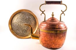 A large copper and brass bound kettle, 41cm high, together with an Indian brass tray,