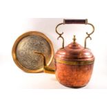 A large copper and brass bound kettle, 41cm high, together with an Indian brass tray,