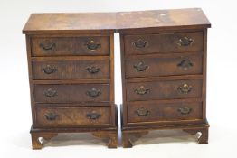 A pair of bedside chests in mahogany veneer set four drawers on bracket feet,