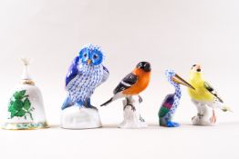 Two Herend figures of an owl, and a stork together with a bell and two Meissen figures of birds