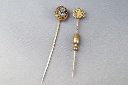 Two yellow metal tie pins, tested as 9ct gold. Gross weight: 5.