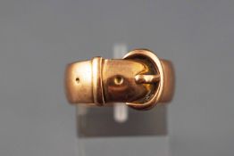 A yellow metal buckle ring. Hallmarked 9ct gold, Chester, 1915.