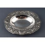 A silver bon bon dish of oval form, the edge chased with shells and scrollwork, by Walker and Hall,