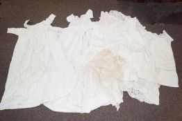 Various early 20th century christening gowns and other linen