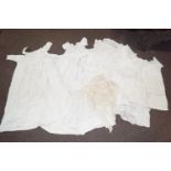 Various early 20th century christening gowns and other linen