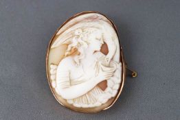 A large rose metal cameo brooch measuring 53.0mm x 42.0mm.