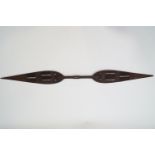 A Polynesian Ceremonial paddle with geometric carved decoration,