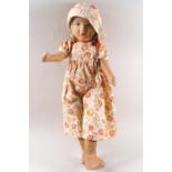 A Chad Valley doll, in the form of a young girl wearing a flower, hat and dress, 42cm high,