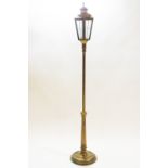 A Victorian brass framed lantern, converted to electricity,