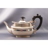 A silver bachelor teapot of belled rectangular form with gadrooned edge, ebony handle and knop,