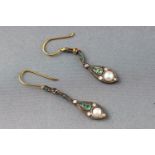 A pair of drop earrings set with diamonds, emeralds and pearls. Tests indicate silver/silver gilt.