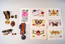 Two WWI medals, badges, 1914-18, silk cards and a Metropolitan Manchester Police whistle