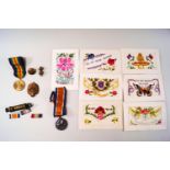 Two WWI medals, badges, 1914-18, silk cards and a Metropolitan Manchester Police whistle