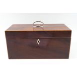 A Regency mahogany tea caddy with boxwood string inlay, with silver plated ring handle,