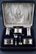 A cased set of six numbered plain napkin rings, each engraved with the initial 'H', Birmingham 1918,
