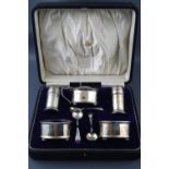 A cased set of six numbered plain napkin rings, each engraved with the initial 'H', Birmingham 1918,