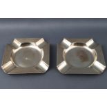 A pair of silver Art Deco style engine turned octagonal ash trays by Mappin and Webb,