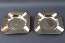 A pair of silver Art Deco style engine turned octagonal ash trays by Mappin and Webb,