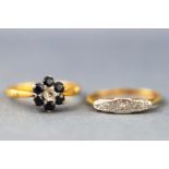 A yellow metal sapphire and diamond flower cluster ring, hallmarked 18ct gold,