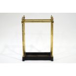 A rectangular brass stick stand with cast iron base,