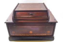 An early Victorian "seraphonic" music box with four songs, in gilt painted mahogany case,