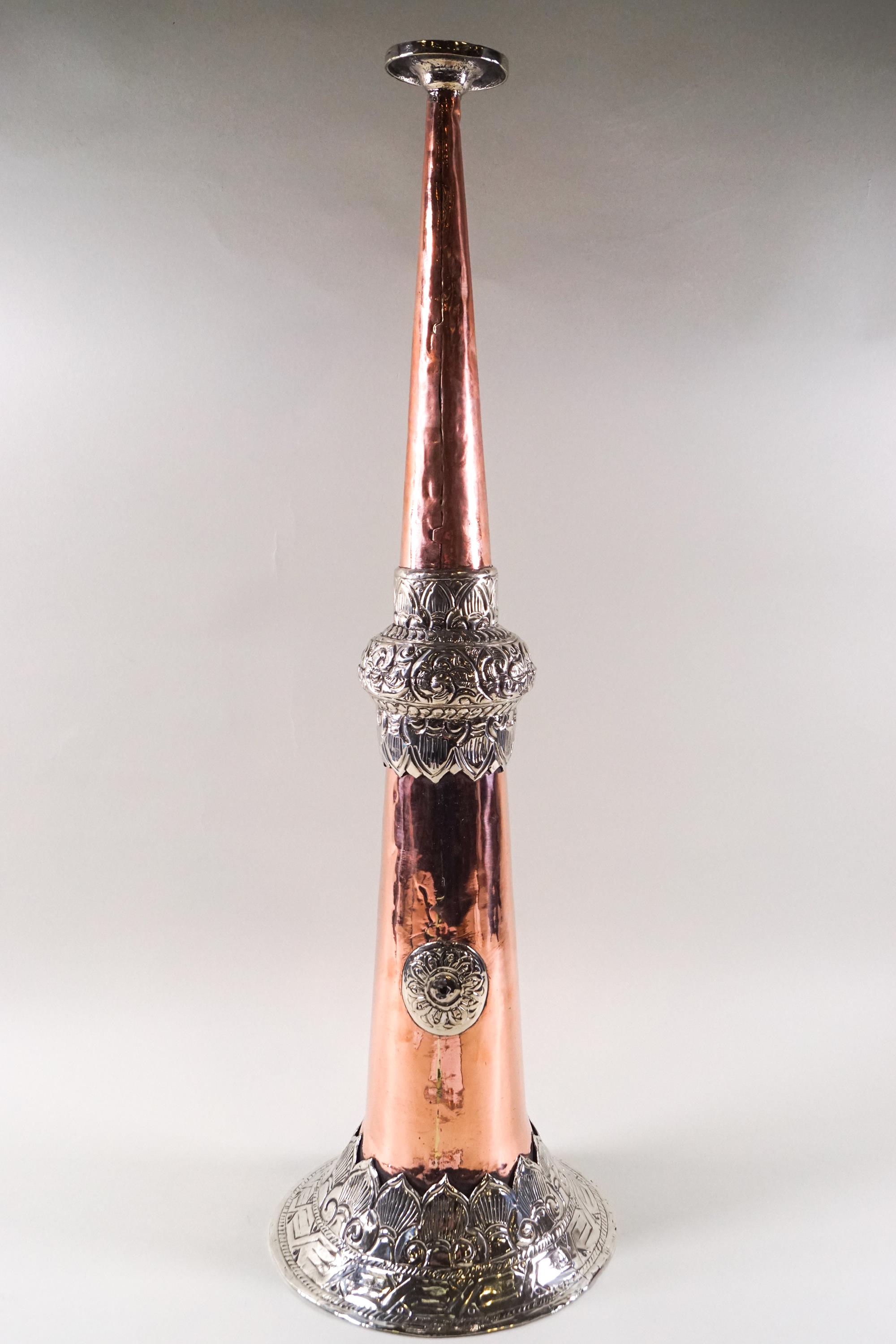 A copper and white metal Tibetan temple horn, of large proportions,