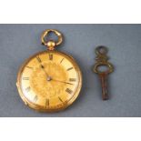 An open face engraved case pocket watch, key wound movement (key supplied). Case stamped 18K.