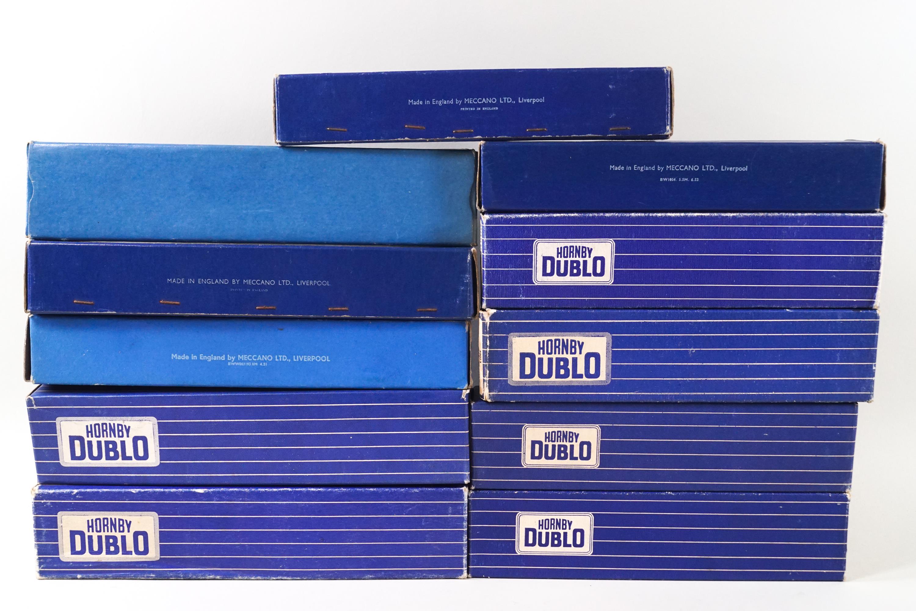 Eleven Hornby Dublo Corridor and Suburban Coaches, three in plain blue boxes,