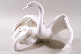 A Royal Doulton porcelain figure of two swans from the Images of Nature series,