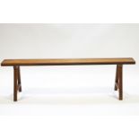 A bench/stool with square legs,