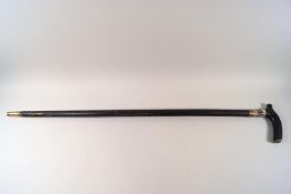 A 19th century Anglo-Indian swordstick with carved bone collar and ebonised shaft