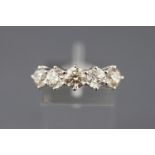 A white metal five stone diamond ring. Approx total weight 2.63 carats.