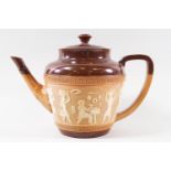 A Doulton stoneware teapot with applied Egyptian figures, impressed marks,