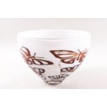 A Kosta Boda glass bowl decorated with butterflies on a white ground, etched factory marks,