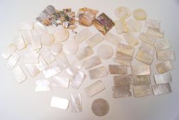 A small collection of mother of pearl gaming counters,