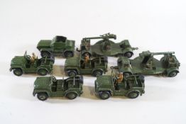 Dinky - Four Austin Champs No 674, a Scout Car No 673 and two guns