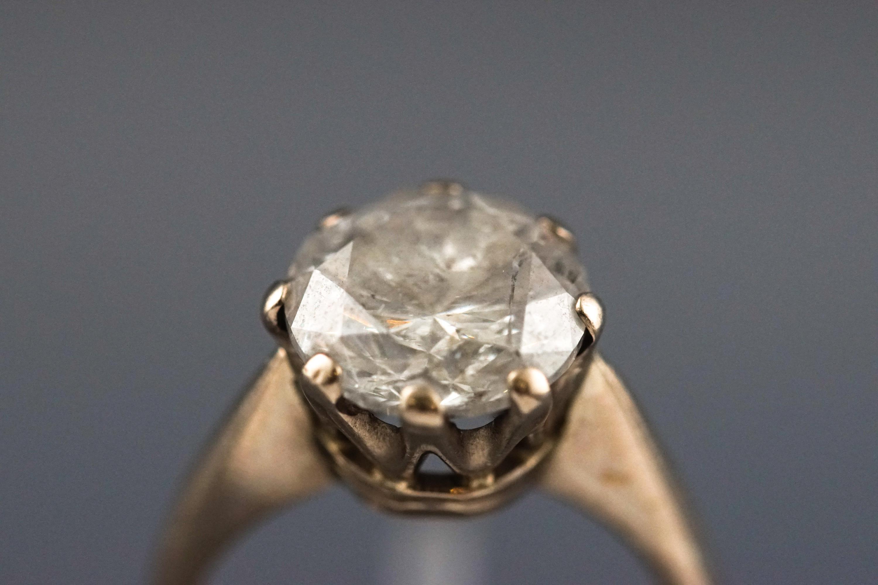 A white metal single stone diamond ring. - Image 2 of 13