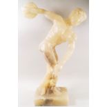 A large carved onyx statue on rectangular base, after the antique of the Discobolus,