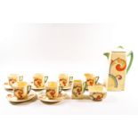 A Royal Doulton 'Duveen' pattern Syfen D3102 coffee service, together with a Sylvac jug,