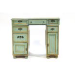A small painted kneehole desk/dressing table finished in blue and cream,