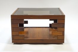 A mahogany retro style square coffee table, with smoked glass top, 43cm high,