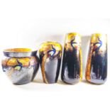 A garniture of four Phoenix ware vases,