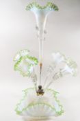 A Victorian five branch glass epergne with central flure surrounded by four flutes,
