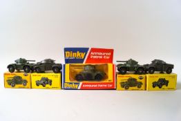 A Dinky amoured patrol car No 667, two armored cars No 670 and two amoured cars No 814,