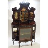 An Edwardian mahogany over mantel display cabinet,