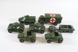 Dinky, two Scout cars No 673, two armored cars No 670, a military ambulance No 626,