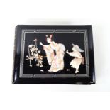 A Japanese lacquer post card album with applied carved bone and mother of pearl,