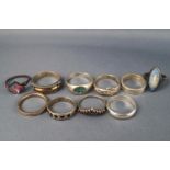 A selection of ten sterling silver dress rings; Size range: L to R